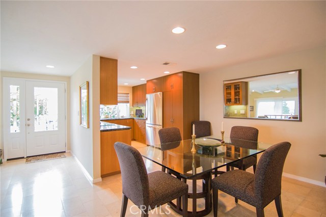 Dining looking towards kitchen & front entry