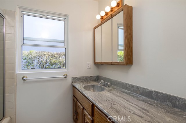 This 3rd bathroom sits at the end of the hallway, close to Bedrooms #2, #3, and #4.