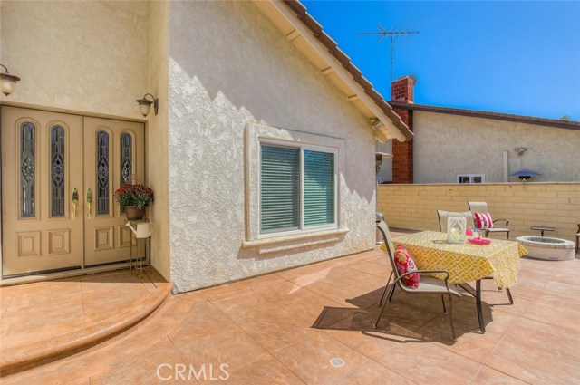 You can't help but notice the potential for entertaining as you walk up to the front door.  Behind the beautifully landscaped front yard is a handsome courtyard which adds to the overall curb appeal of this lovley home.