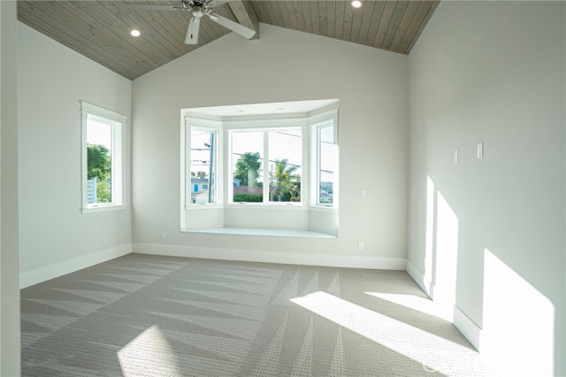 Bedroom 1 with bay window facing front of house.