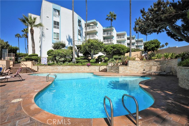 The Resort Like Pool Entertaining area is Spacious, Open and Inviting for Residents and their Guests to enjoy the Ocean View while Sunning and Relaxing. There is a Bubbling Jacuzzi, Lounge Recliners and Chairs, Outside Showers and Beautiful Design Elements Throughout.