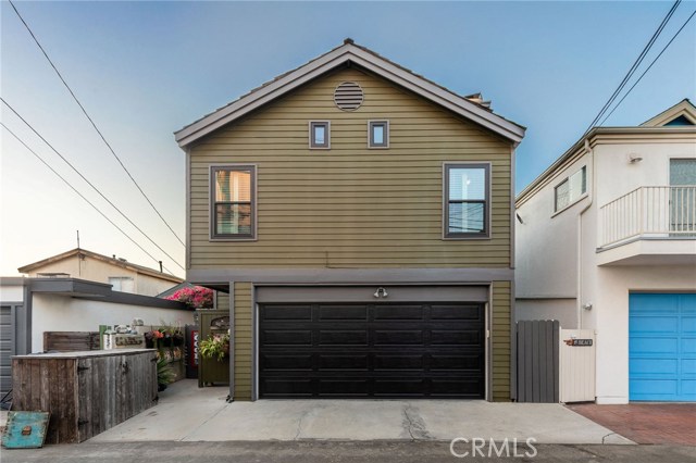 Two car garage plus parking, street to alley lot