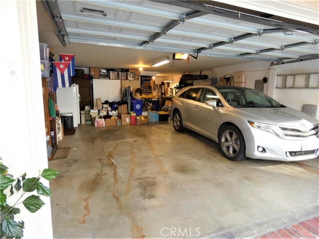 Over-sized 3 car garage with ample storage space..