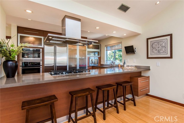 Breakfast bar for 4!  Top of the line appliances complete with built in Dacor espresso/cappuccino maker!