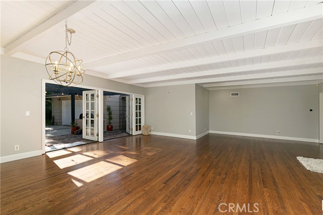 Open floorpan with updated, recessed LED lighting completed with recent remodel, along with motion sensing lighting on garage.