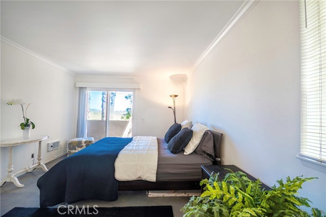 Master Bedroom with access to Balcony and views of estuary