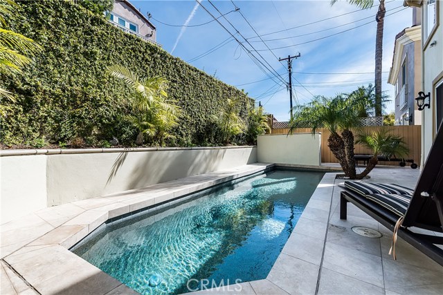 Beautiful lap pool (7' x 34') with some southern exposure.  Nicely landscaped and serene environment