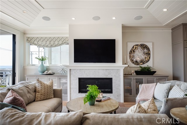 Beautiful living room with fireplace and built-in cabinetry