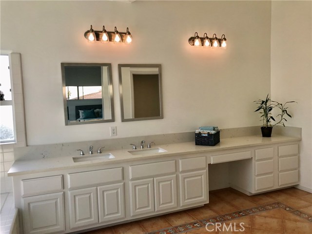 This bathroom is so spacious with benefit high ceilings that we added another photo.