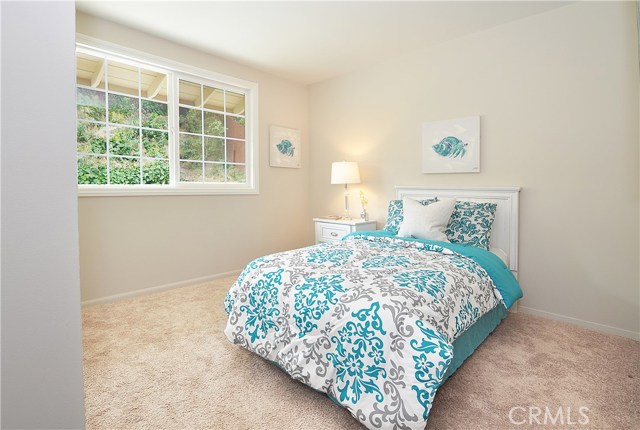 Bedroom #3 has new Mirror Closet Doors, neutral carpeting & paint, Dual Pane Windows