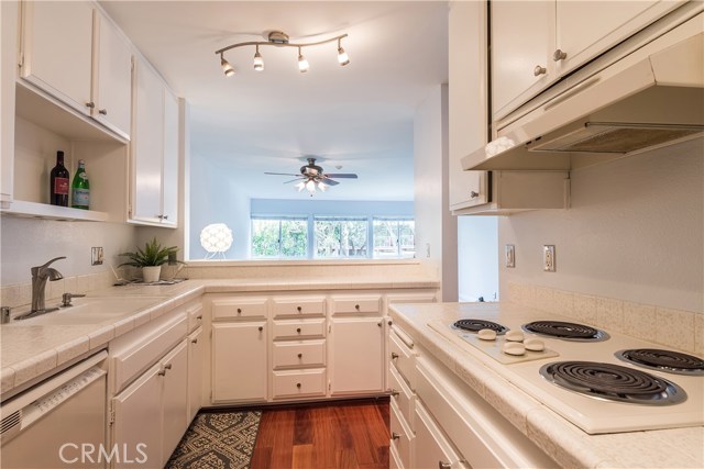 Kitchen opens to the living/dining room so the chef is never isolated.