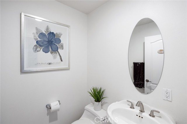 Simple and elegant powder room downstairs. Simple and elegant powder room downstairs.