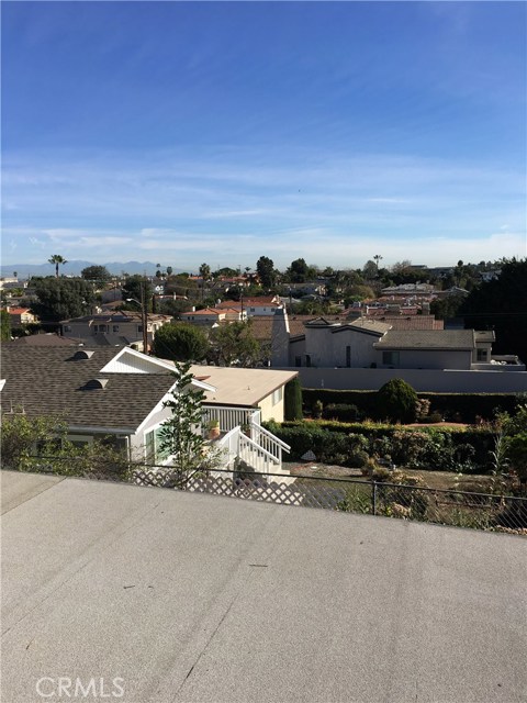 This view photo was taken from the roof of the rear rec room. Buyer's elevations may be different.