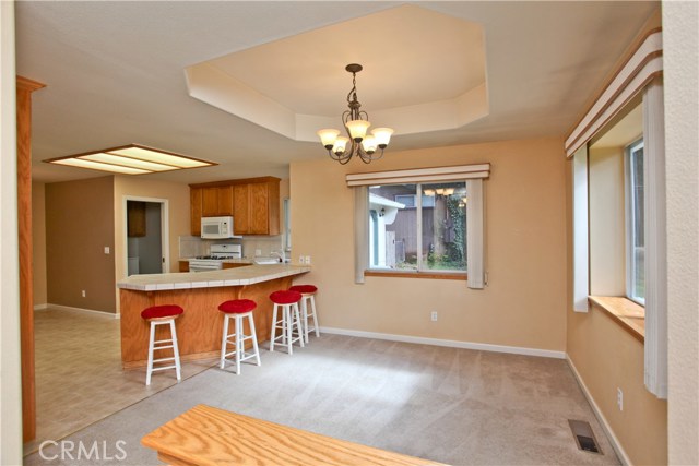 Formal dining area with tray ceiling