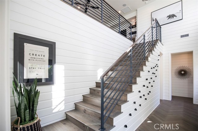 Single-story home; only a loft  is upstairs to provide a bonus space. Model home shown.