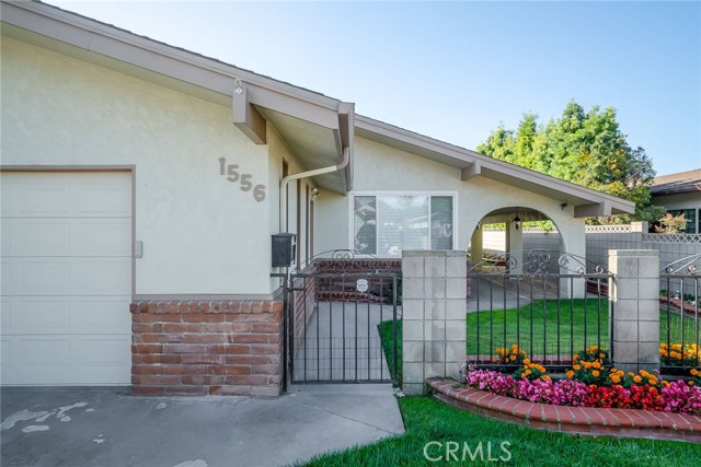 Large covered front entryway and approach provides shade and keeps the interior much cooler.  There is A/C and the dual paned windows also help insulate the interior.