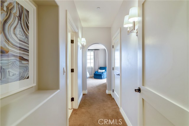 Hallway to private bedroom suite.