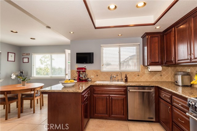 Bar seating, separate breakfast area and adjoining balcony with wonderful views