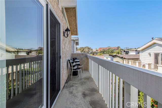  The balcony off the spacious upstairs room is long enough for several seating areas. Add twinkle lights, some climbing ivy, an outdoor rug and voila.. you have another outdoor area for enjoyment.