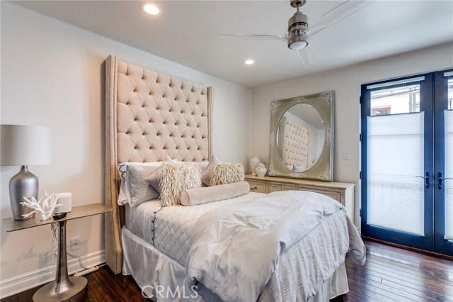 Down the hall are the other 2 bedrooms, joined by a jack'n'jill bathroom. This bedroom has a private terrace and is on the south west side of the home.