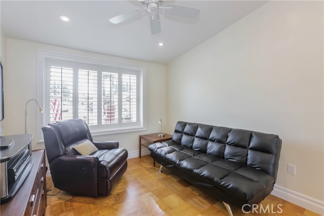 Third bedroom, hardwood floors, plantation shutters, new windows