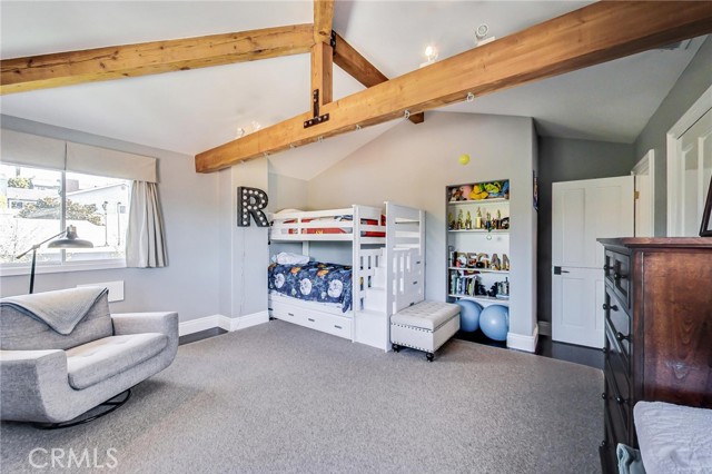 Built-in shelving adds a nice touch to bedroom #4.