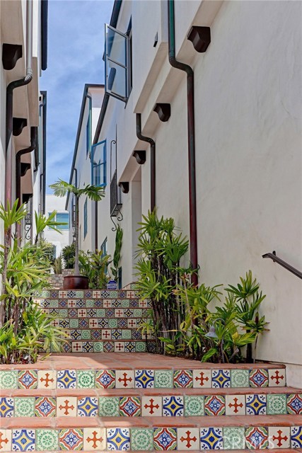 Stunning Santa Barbara style sand section townhome.