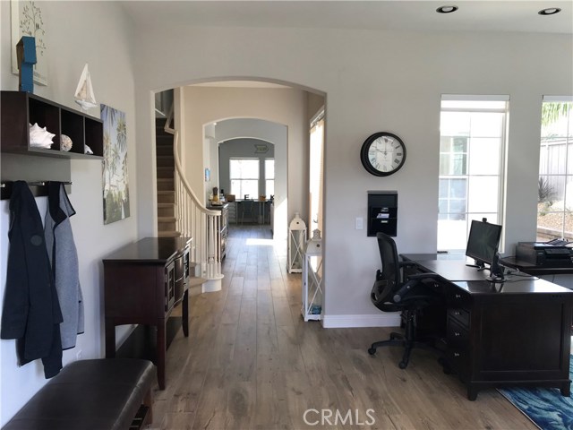 Entry Area and den/bonus room, porcelain tile floors throughout