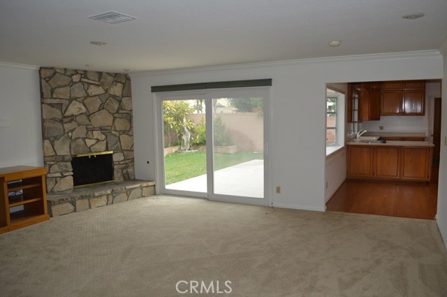 Family Room with Fire Place just off the Kitchen