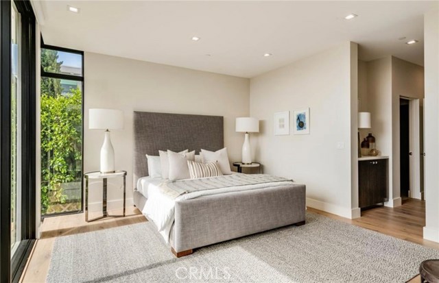 One level down is the master suite which is light and bright on the west side of the property and includes a master bath, private balcony and large walk in closet