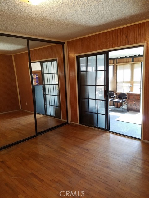 Middle Bedroom with access to Solarium & Rear Exit