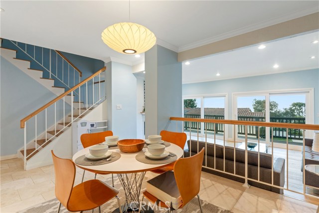 Dining room sits above the living area.  Views are enjoyed on both levels.