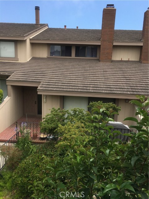 View of the neighbors porch from the master bedroom balcony