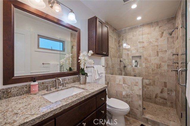 Beautifully remodeled bathroom in the back unit.