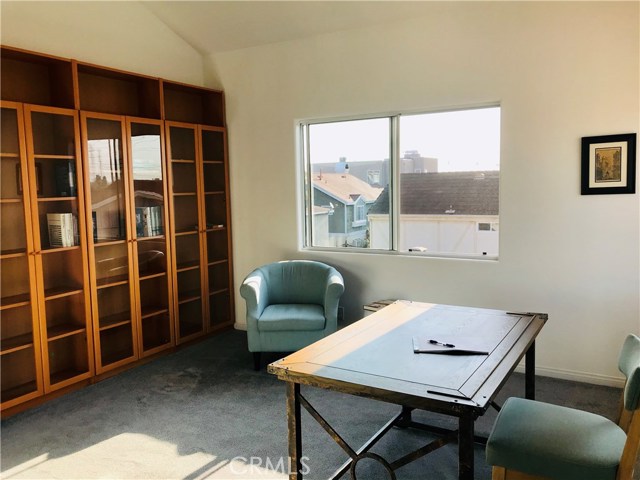 This legal bedroom (used as an office here) is versatile for the needs of your home. The wall unit can be easily removed or used for showcasing a variety of items from books, projects and awards from school, diplomas, or your favorite items for display.
