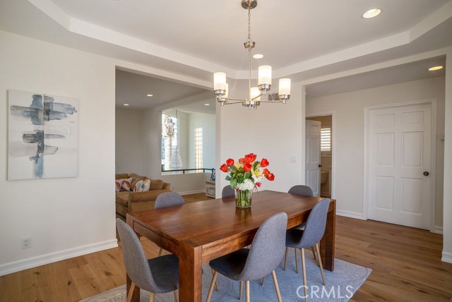 Perfectly balanced Dining Room continues the open floor plan yet offers intimate separation and design.