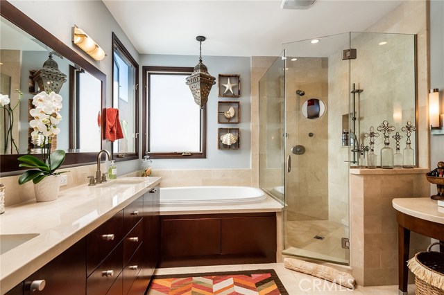 The master bath has double sinks, spa tub, large shower and a separate make up area.