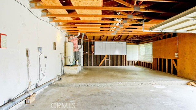 This feature makes the house extra special.  The garage is double wide.  2 car garage side with another section for storage, or to convert into a bedroom, modify to make separate laundry room