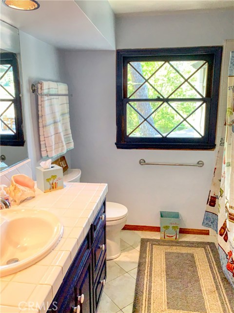 This bathroom is connected to one of the 3 bedrooms.