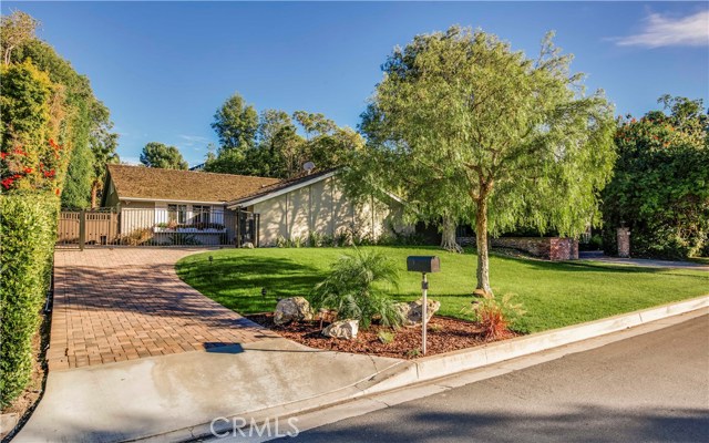 Private gate with custom paver driveway