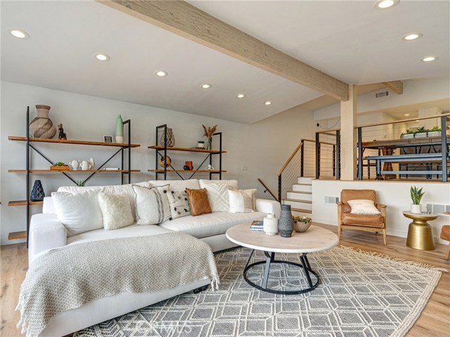 Completely and stunningly remodeled in 2019.  Wood beamed ceilings, Vittoria French oak flooring throughout, expansive sliding doors, recessed lighting.