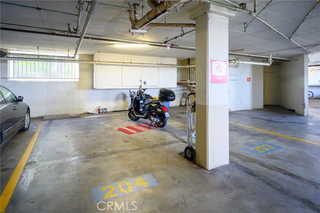 Two parking spaces, with storage and a separate storage closet.