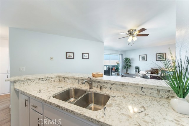 Quartz countertops and an open layout pefect for social living