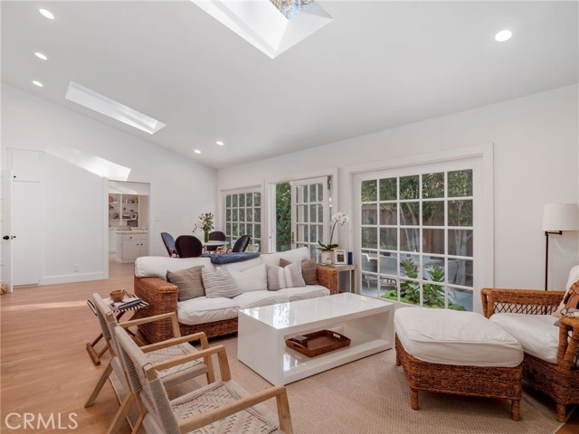 Light & bright living room with two skylights