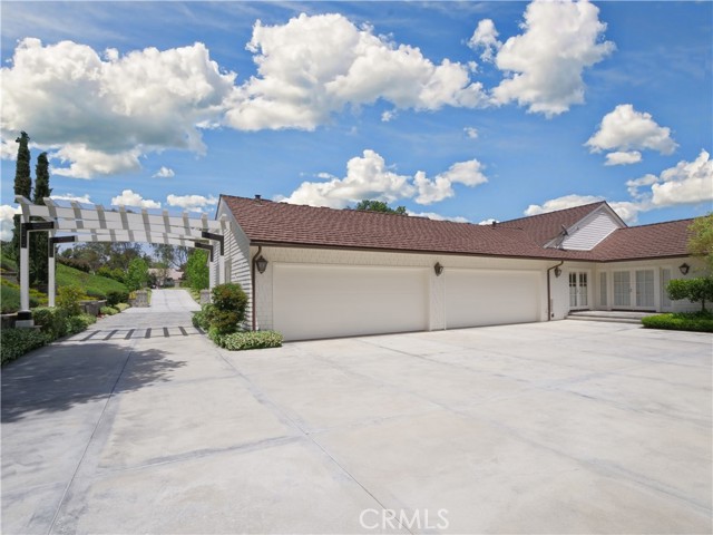 Over sized four car garage with huge driveway space for additional parking