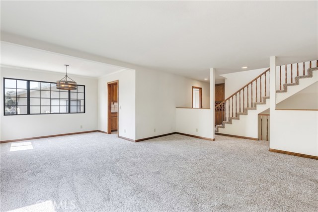Living room towards dining area and kitchen