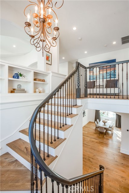 Built-ins line the staircase as you journey upstairs