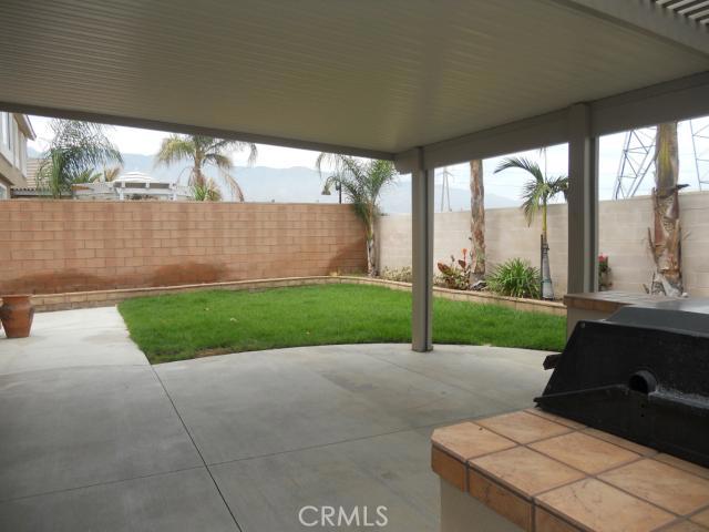 Solid covered patio space w/built-in BBQ