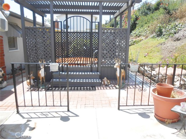 Full View of Custom Gazebo with Security Gate Leading to Spa!