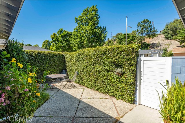 View of secluded front courtyard at the property's entrance